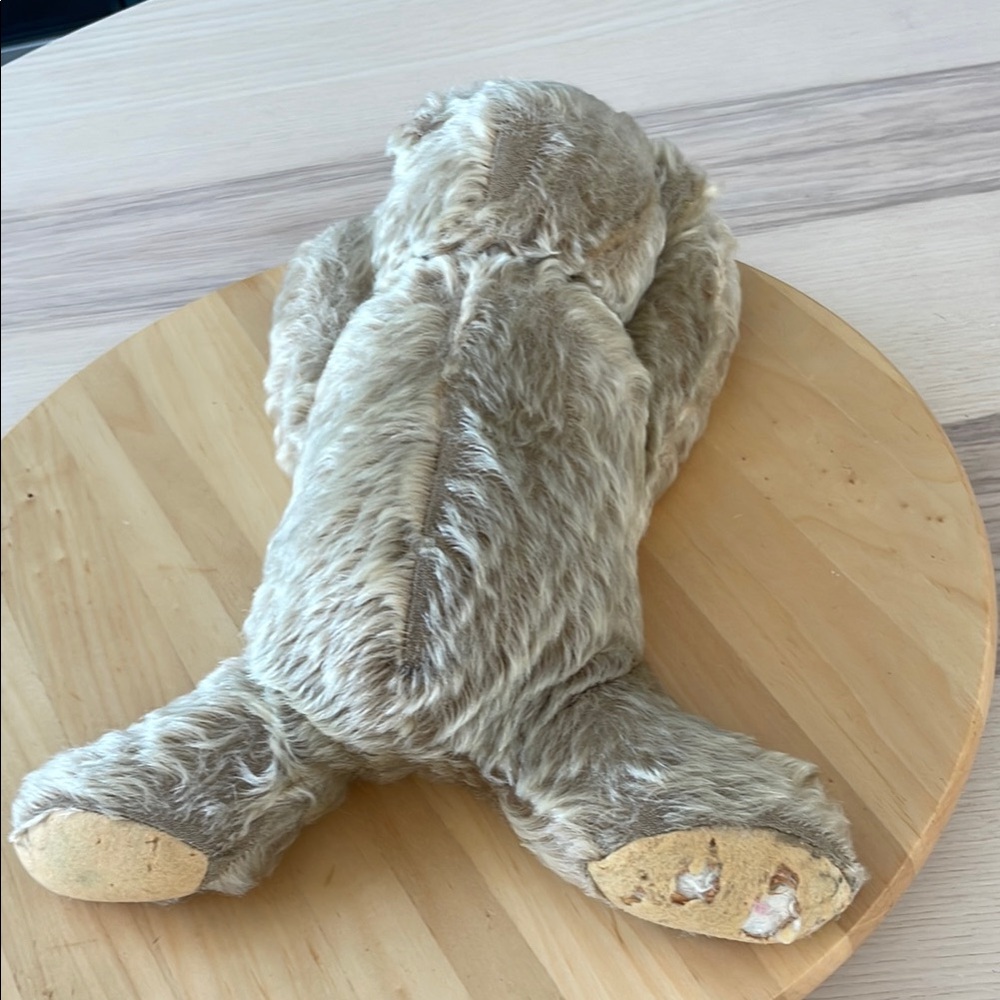 Steiff sleeping teddy bear. Vintage. Has a bell in the left paw.